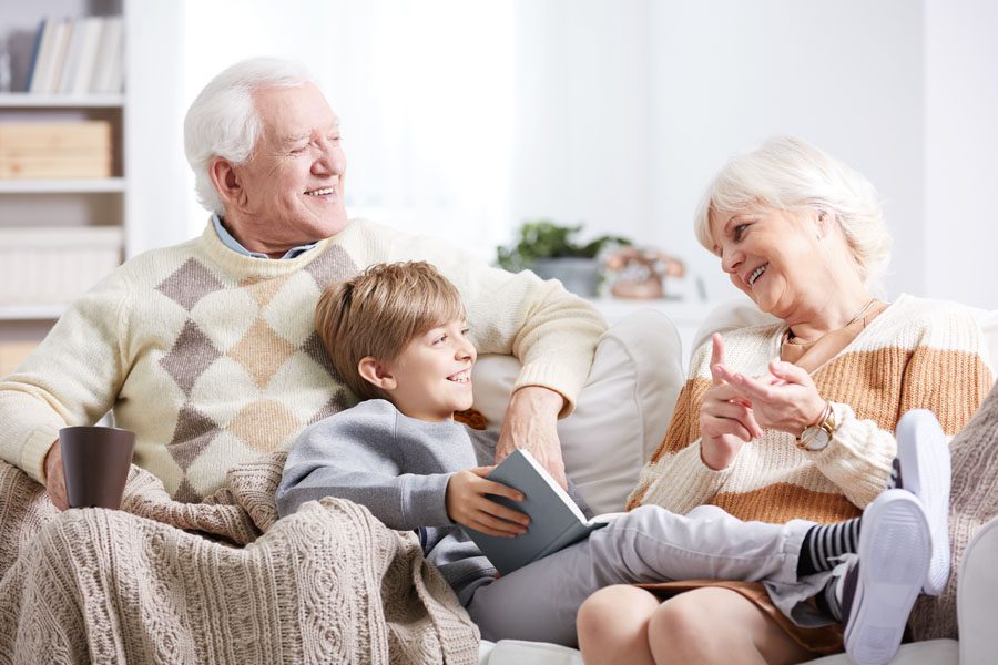 Individual Retirement Accounts - Grandparents with Grandchild on the Couch